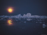 The Sun Casts a Reflection on the Water During a Late Summer Night in Antarctica Photographic Print by Maria Stenzel