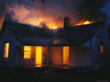 A House is Engulfed in Flames in a Firefighting Exercise Photographic Print by Stephen Alvarez