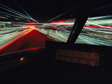 Time Exposure Showing Streaks of Colored Lights Fotografisk tryk af Paul Chesley Time Exposure Showing Streaks of Colored Lights Fotografisk tryk af Paul Chesley
