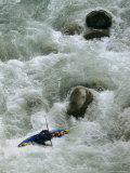 Kayaker Paddles Through the Swirling Water of the Futaleufu River Photographic Print by Skip Brown