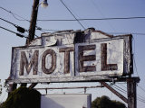 A Neon and Plywood Motel Sign Shows its Age Photographic Print by Stephen St. John