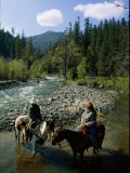 Horseback Riders Stand in Coffee Creek Photographic Print