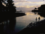 Local Couple Takes a Dip in the Bay at Sunset Photographic Print by Randy Olson