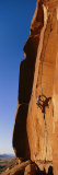 Climber on a Sandstone Wall Photographie par Bill Hatcher