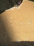 A Climber Atop a Rock Photographie