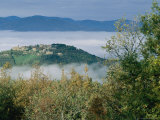 A Village on a Hilltop in Umbria Peaks out over the Surrounding Mist Photographic Print by Tino Soriano