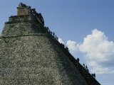 Tourists Scale the Steep Steps of the Pyramid of the Magician Photographic Print by Kenneth Garrett