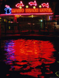 The Magic Beach Motel Sign Reflects in the Motel Pool Photographic Print