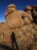 A Human Shadow is Projected onto One of the Devils Marbles Photographie