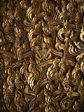 Ornate Flame-Like Carving Surrounds Buddha on a Relief Sculpture Photographic Print by Jodi Cobb
