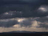Rays of Sunlight Shine Through Clouds Above Albuquerque Photographie