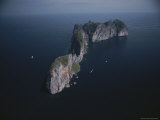 A Mountainous Island Rises from Phangnga Bay Photographie