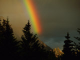 Rainbow from Evening Thunderstorm over Mount Rundle Photographic Print by Raymond Gehman