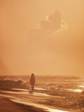 A Person Walks Along the Beach Photographie