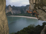 A Climber Negotiates an Overhang on Railay Beach Photographic Print by Bobby Model