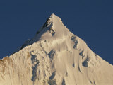 A View of the 7,000 Meter Jitchu Drake Bathed in Morning Sunlight Photographie