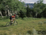 A Cyclist Takes off Down Clarks Fork Canyon Photographic Print by Bobby Model