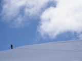 Backcountry Skiing over a Ridge in British Columbia Photographic Print by Bill Hatcher