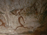 A View of Running Men in a Cave Painting in the Drakensberg Range Valokuvavedos tekijänä Kenneth Garrett A View of Running Men in a Cave Painting in the Drakensberg Range Valokuvavedos tekijänä Kenneth Garrett