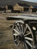 A View of Buildings and an Old Wagon at Bodie Ghost Town Photographic Print