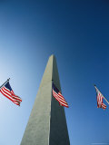 View from the Ground of the Washington Monument and American Flags Photographic Print by Kenneth Garrett