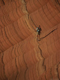 A Hiker Treks Across Sandstone Cross-Beds in Remote Pariah Canyon Photographic Print