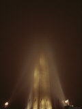 Lights Shine up at the Washington Monument on a Foggy Evening Photographic Print