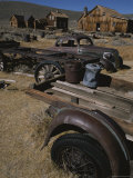 A View of Buildings and Old Vehicles at Bodie Ghost Town Photographic Print by Gordon Wiltsie