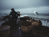 A Chincoteague Crabber Heads out to Work Despite Threatening Weather Photographic Print by Medford Taylor