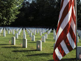 Rows of Tombstones Marked with American Flags Fill a Cemetery Photographic Print