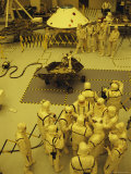Journalists, Engineers and Technicians Examine a Robot in a Clean Room Photographic Print