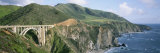 Bixby Bridge over Bixby Creek, Along Highway 1, and Hurricane Point Photographic Print by Rich Reid