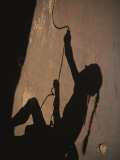 The Shadow of a Rock Climber on a San Rafael Cliffside Fotografisk tryk af John Burcham The Shadow of a Rock Climber on a San Rafael Cliffside Fotografisk tryk af John Burcham