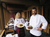 The Emerald Lake Lodge Chef and a Waitress Display Plates of Food Photographic Print by Michael Melford