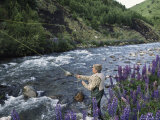 A Fly Fishing Guide Casts His Line Near Coyhaique, Chile Photographic Print