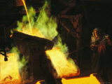 A Man in Protective Gear Tends a Smelter at Magma Metals Company Photographic Print by Joel Sartore