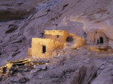 A Spotlight Illuminates Ancient Anasazi Ruins Photographic Print