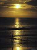 Moonlight Reflection on Water and Silhouetted People at Waters Edge Photographic Print by Wolcott Henry