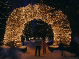 An Arch Built of Antlers is Covered in Lights at the Town Square Photographie