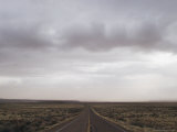 An Empty Road Stretches Toward the Horizon in New Mexico Photographic Print