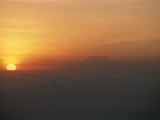 Sun Sets over Mount Kilimanjaro, Seen from Ol Doinyo Lengai Volcano Photographic Print by Carsten Peter