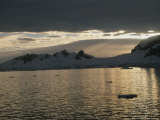 Sunrise over Neumeyer Channel with Wiencke Island in the Background Photographic Print by Gordon Wiltsie