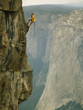 Climber Makes his Way up a Rock Face to Taft Point Photographie