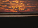 Sunset over a Salt Marsh with Cordgrass Photographic Print by Raymond Gehman