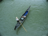 Gondolier Rowing his Gondola down the Grand Canal Photographic Print