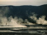 Man Stands Amidst Thermal Hot Springs on the Uzon Caldera Photographic Print