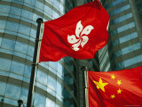 The Flag of Hong Kong Next to a Peoples Republic of China Flag Photographic Print by Justin Guariglia