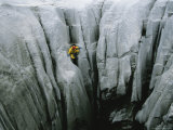 Caver Descends an Eroded Limestone Wall on Madre De Dios Island Photographic Print