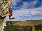 Young Man Climbing the Rock Feature Known as Bobcat Logic Photographie