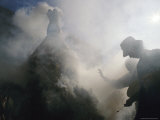 Tibetan Buddhists Pray and Make Offerings Photographic Print by Justin Guariglia